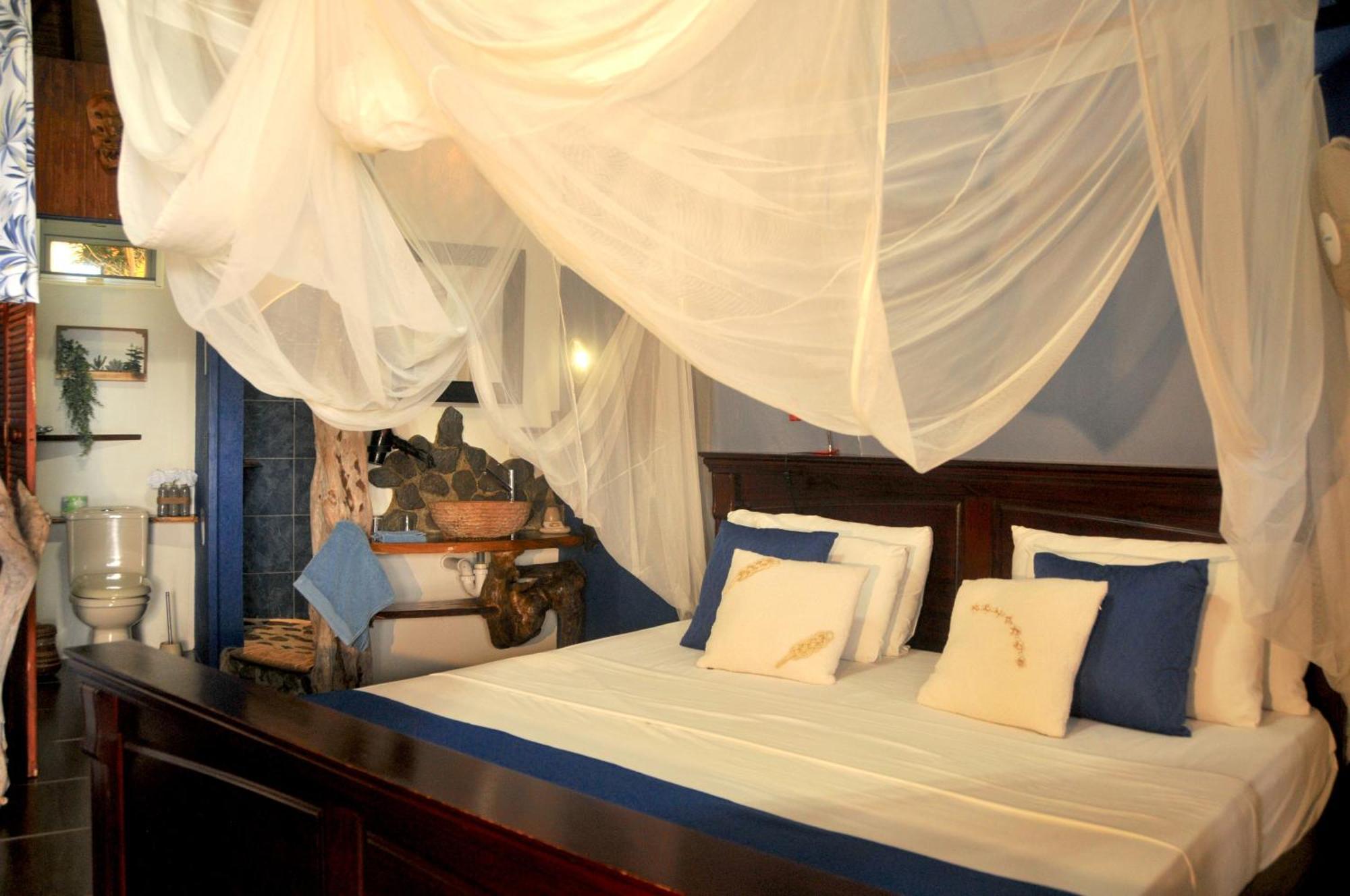Mango Island Lodges Saint Joseph Buitenkant foto